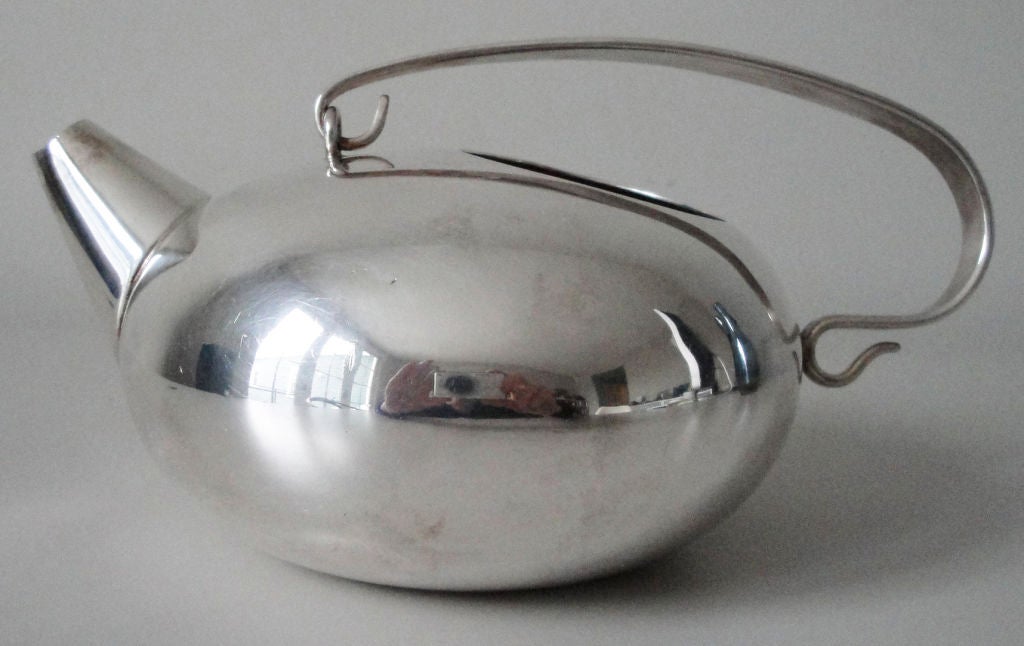 Small silver teapot made by Christofle, Paris