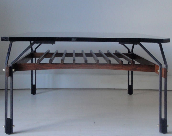 Italian coffee table attributed to Gianfranco Frattini. Metal structure with high gloss, black lacquered top and feet. Rosewood slatted lower tier.