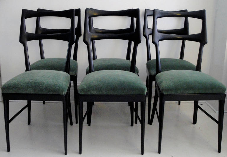 Set of six Vittorio Dassi black lacquered walnut chairs. Newly reupholstered in green mohair.