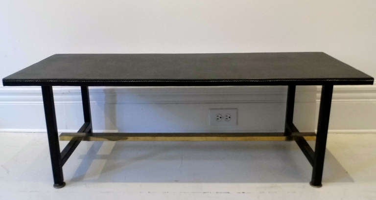 M. Mategot coffee table. Vinyl top with stitches, black painted metal base with brass stretcher. Mategot's 
