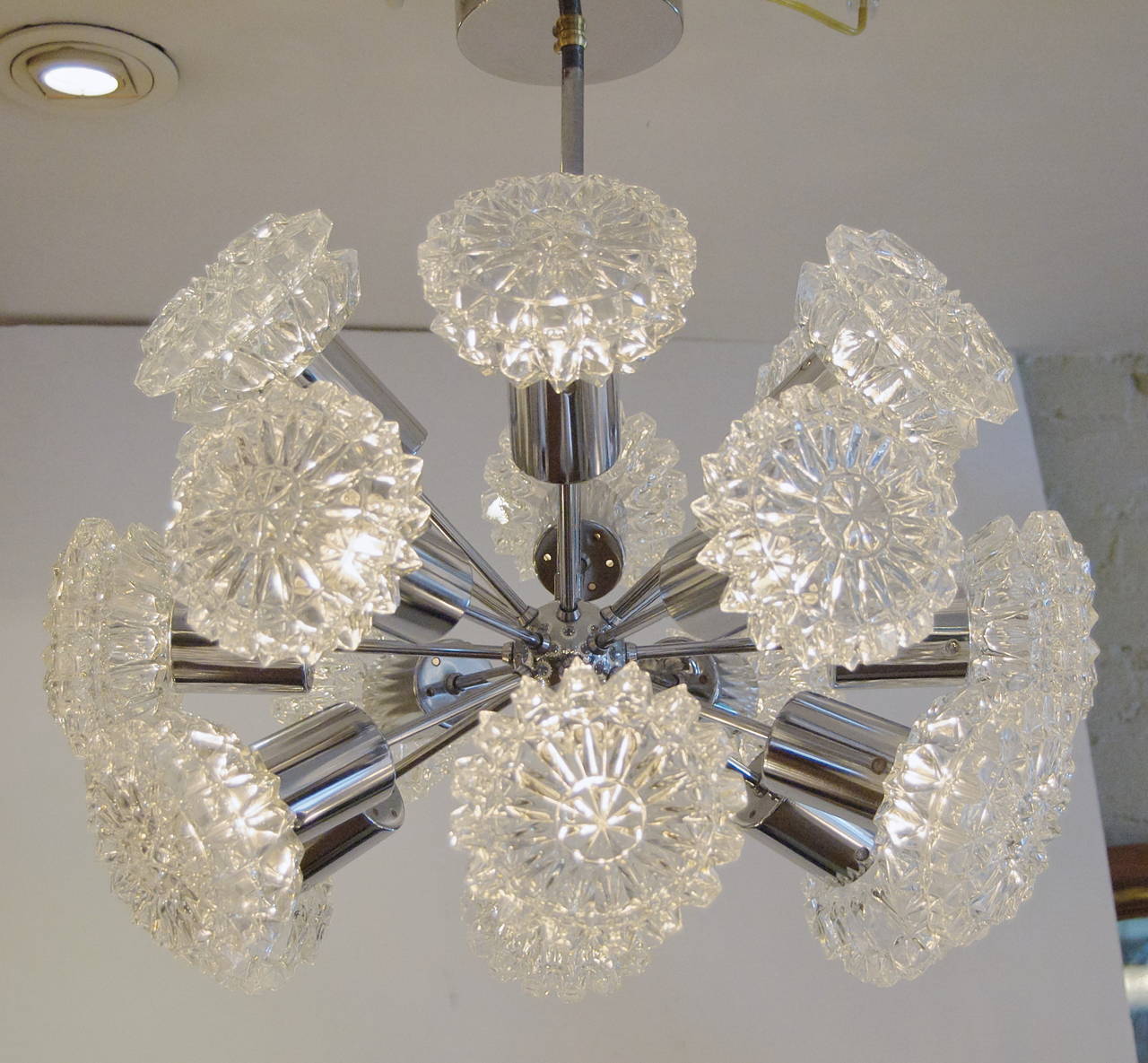 Glamorous Sputnik chandelier with dramatic glass covers, in the style of Richard Essig.

Each arm takes a single E-14 base bulb up to 40 watts per arm; pictured lit with 10 watts bulbs. New wiring.

Height listed is of chandelier body only; height