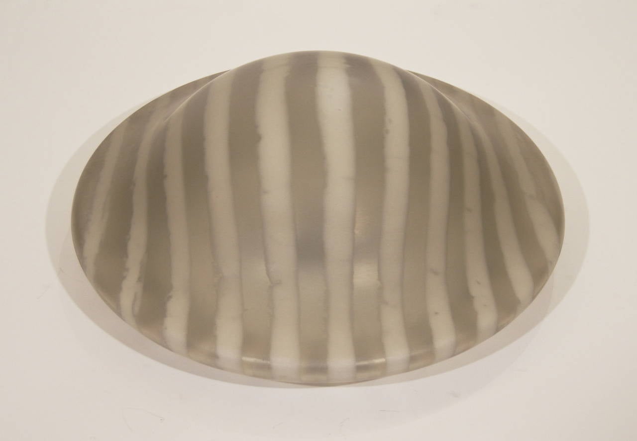 Large flush mount light with matte opalescent glass in a variegated wave pattern, casting a beautiful soft light. Smoke toned glass. 

Two medium based bulbs, 60 watt per bulb, new wiring.

Price per light.