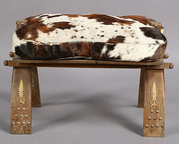 Unusual stools have brass detail and unique and eye catching design with wonderful original hide seat.