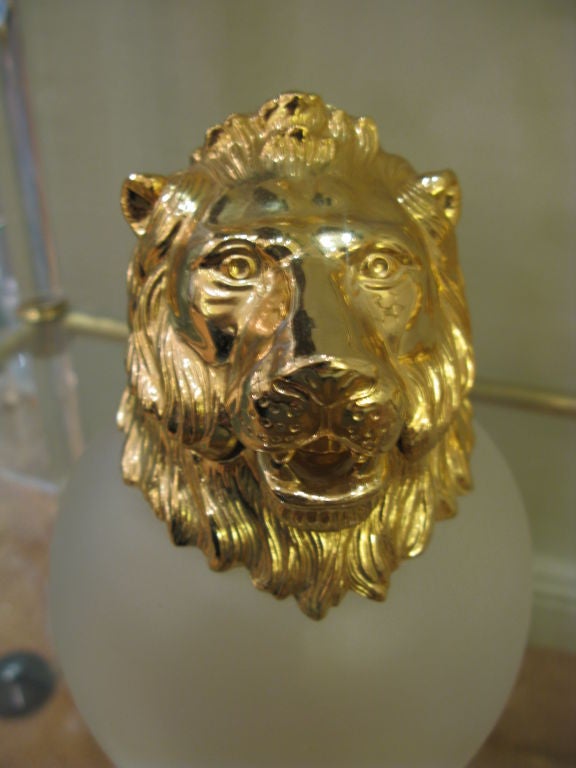 Beautiful pair of Lion's head pitchers would make a great addition to your bar or table service.