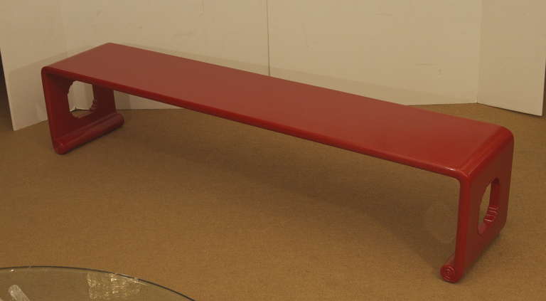 Unique red lacquer bench. Narrow and long dimensions too fit in any and all spaces. Will also work as a coffee table.