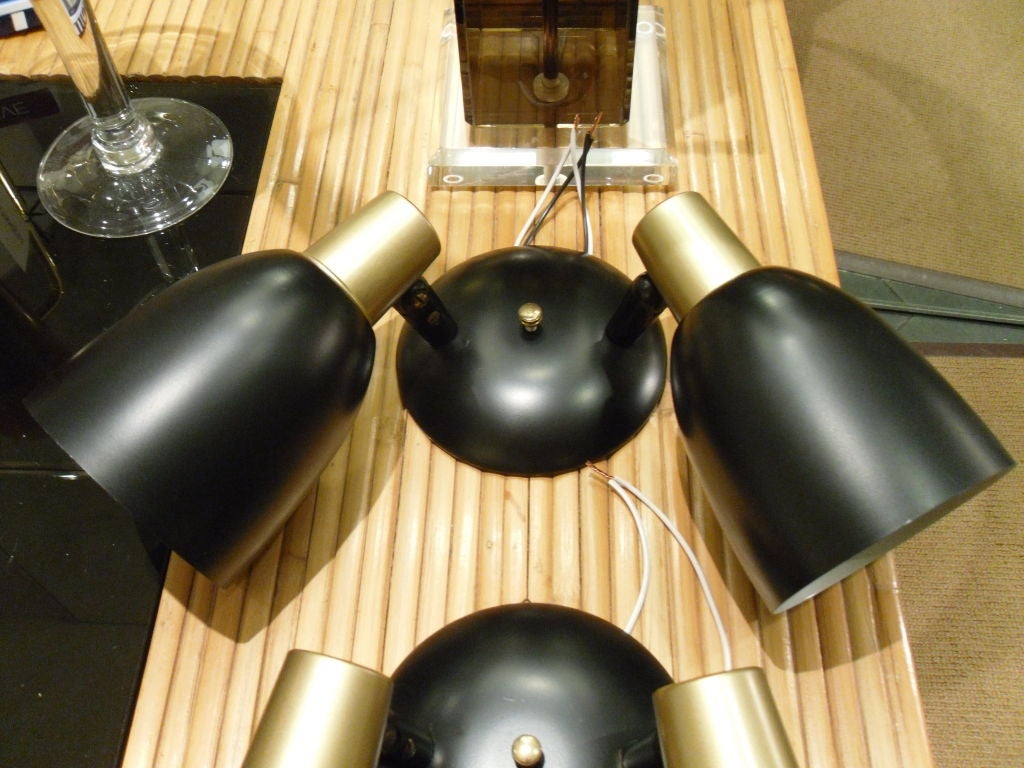 Pair of Double Shade Brass and Black Mid Century Sconces