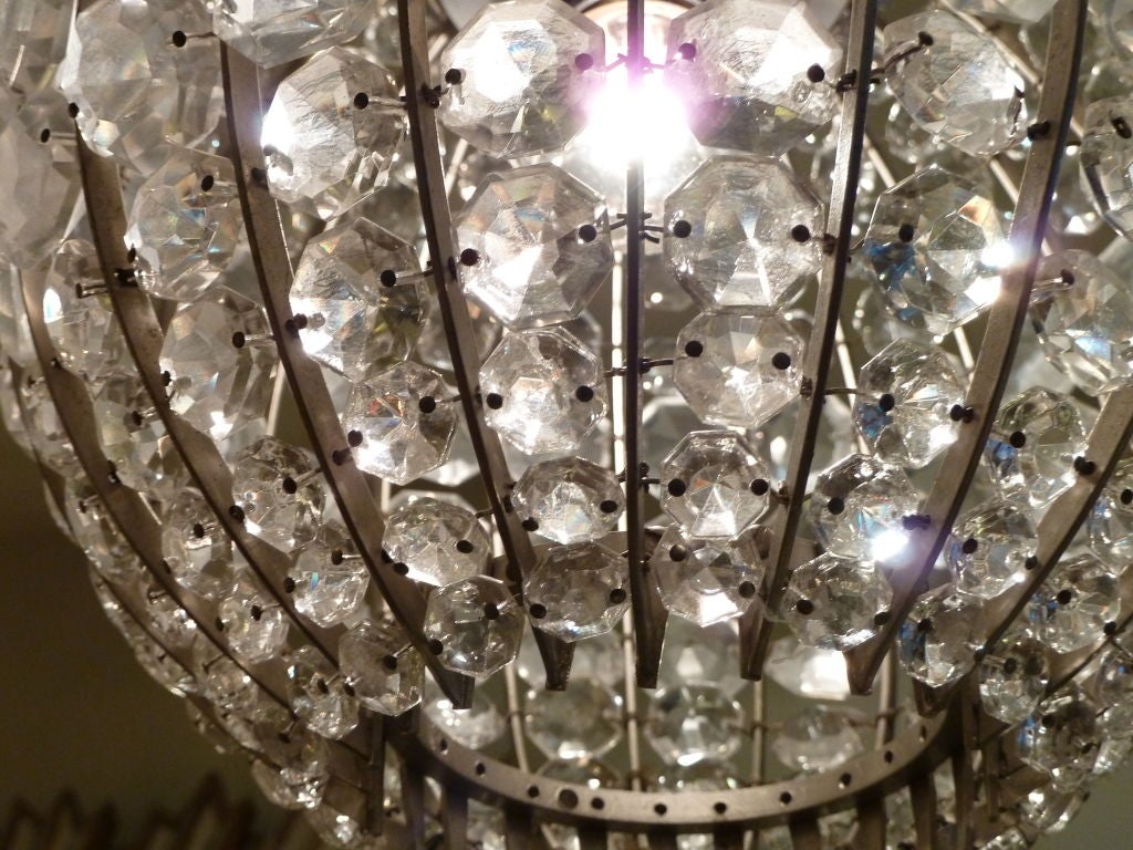 This great regency style globe with rows of cut crystal would make a beautiful statement in any space