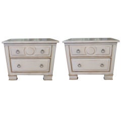Pair of Draper Style Cream and Gilt Glass Top Nightstands