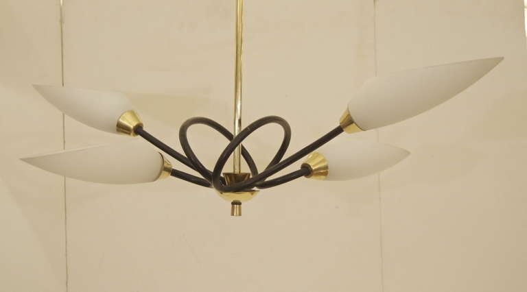 Fantastic looped four arm French chandelier, the arms in black enamel with brass accents, arms capped by scooped form glass shades

Takes 4 B22D bayonet socket bulbs up to 60 watts per bulb. New wiring. Height listed is of chandelier body only;