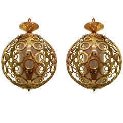 Pair of Brass Circle Motif Hanging Globe fixtures