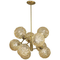 Elegant Spiral Chandelier in Brass with 9 Amber Globes