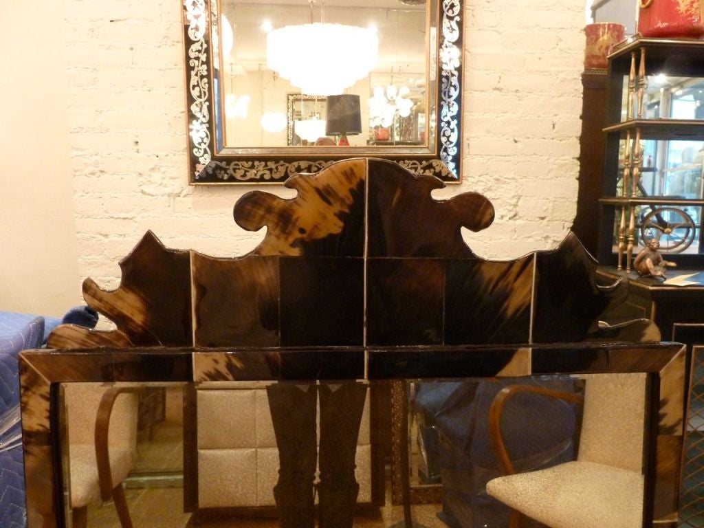 Exquisite rectangular horn mirror with shaped top.  Will be a wonderful addition to any space.