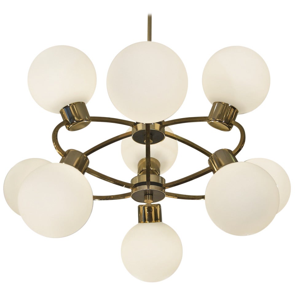 Orbital Brass Chandelier with Nine Opal Glass Globes at 1stDibs