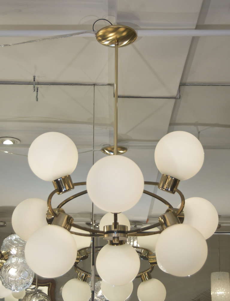 Orbital Brass Chandelier with Nine Opal Glass Globes at 1stdibs