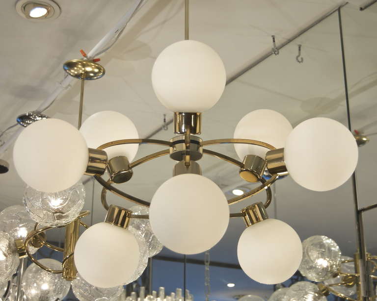 Orbital Brass Chandelier with Nine Opal Glass Globes at 1stdibs