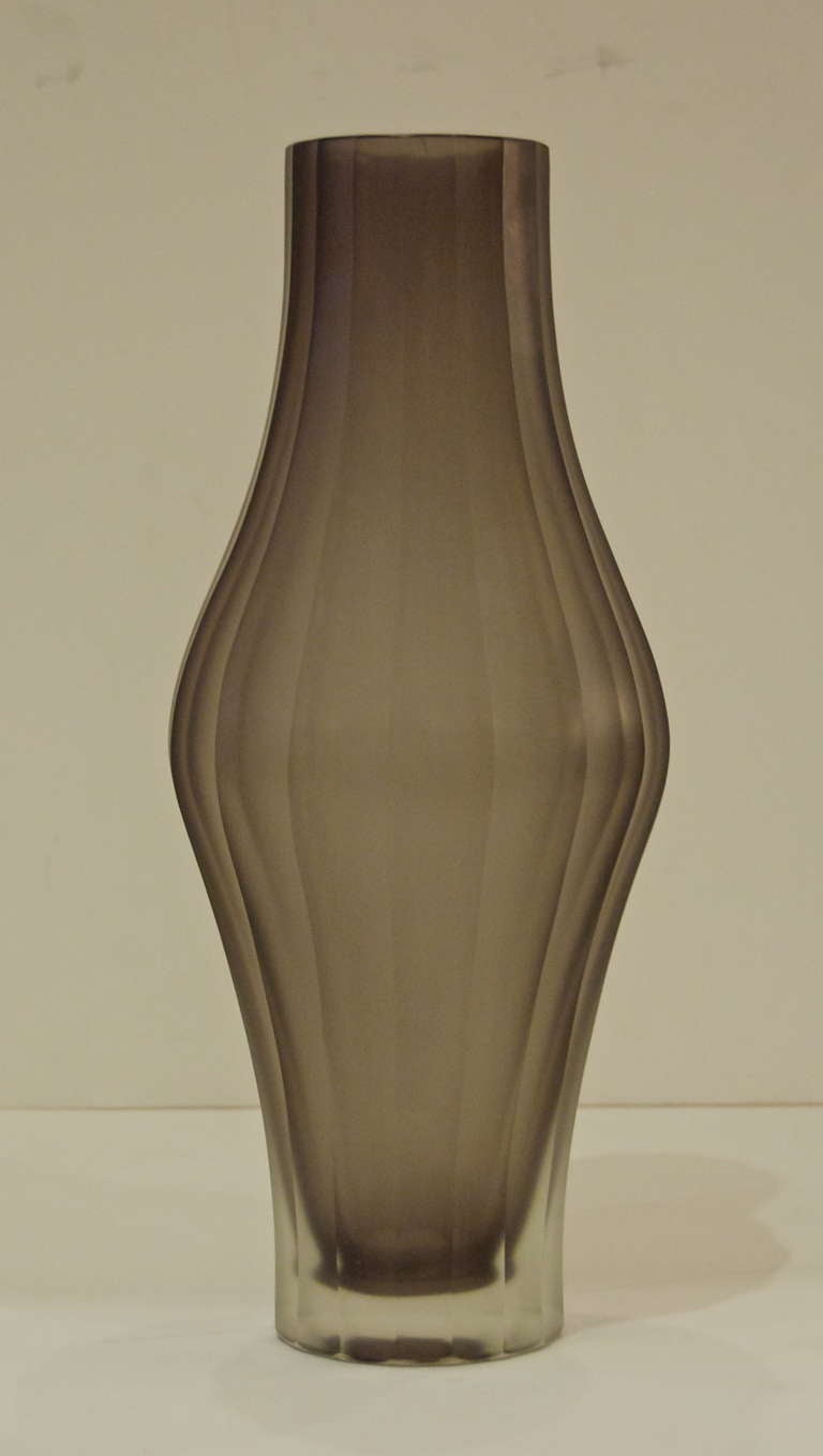 Elegant and dramatic vase with a geometric structure, flaring at the center, interior smoked and exterior frosted. German, unknown maker