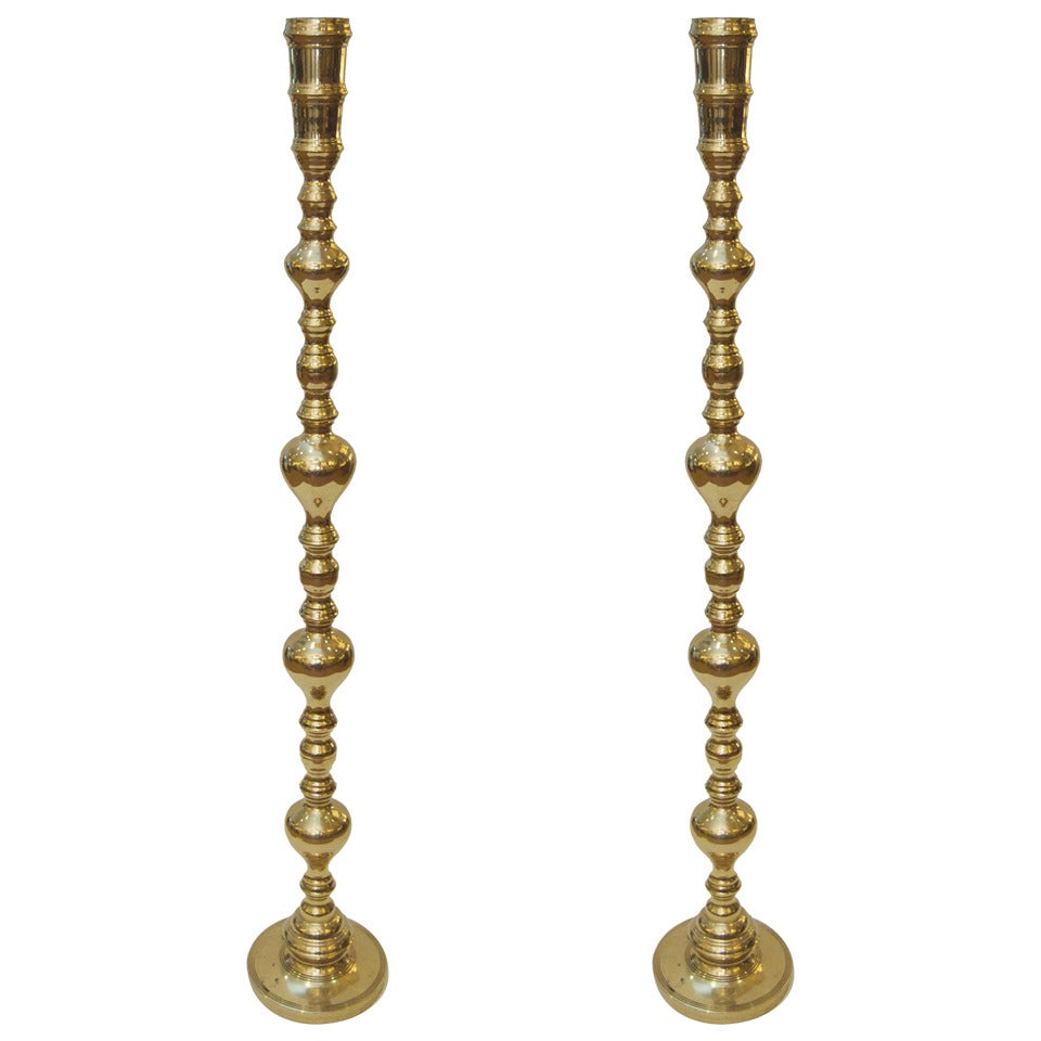 Pair of Grand Scale Brass Standing Candleholders For Sale