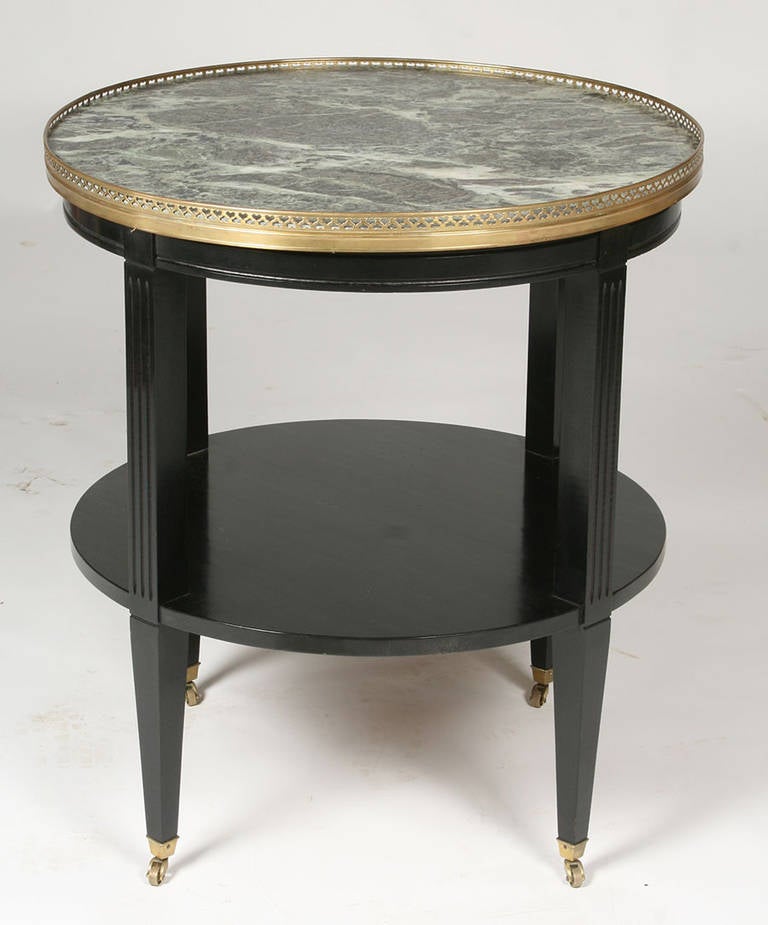 Pair of Large Two-Tier Ebonized Gueridons with Marble Tops