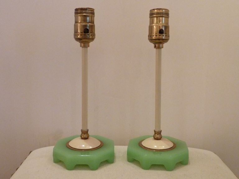 This pair of Petite Jadeite Lamps with cream enamel and brass accents are elegant with great detail  Will enhance all decors.