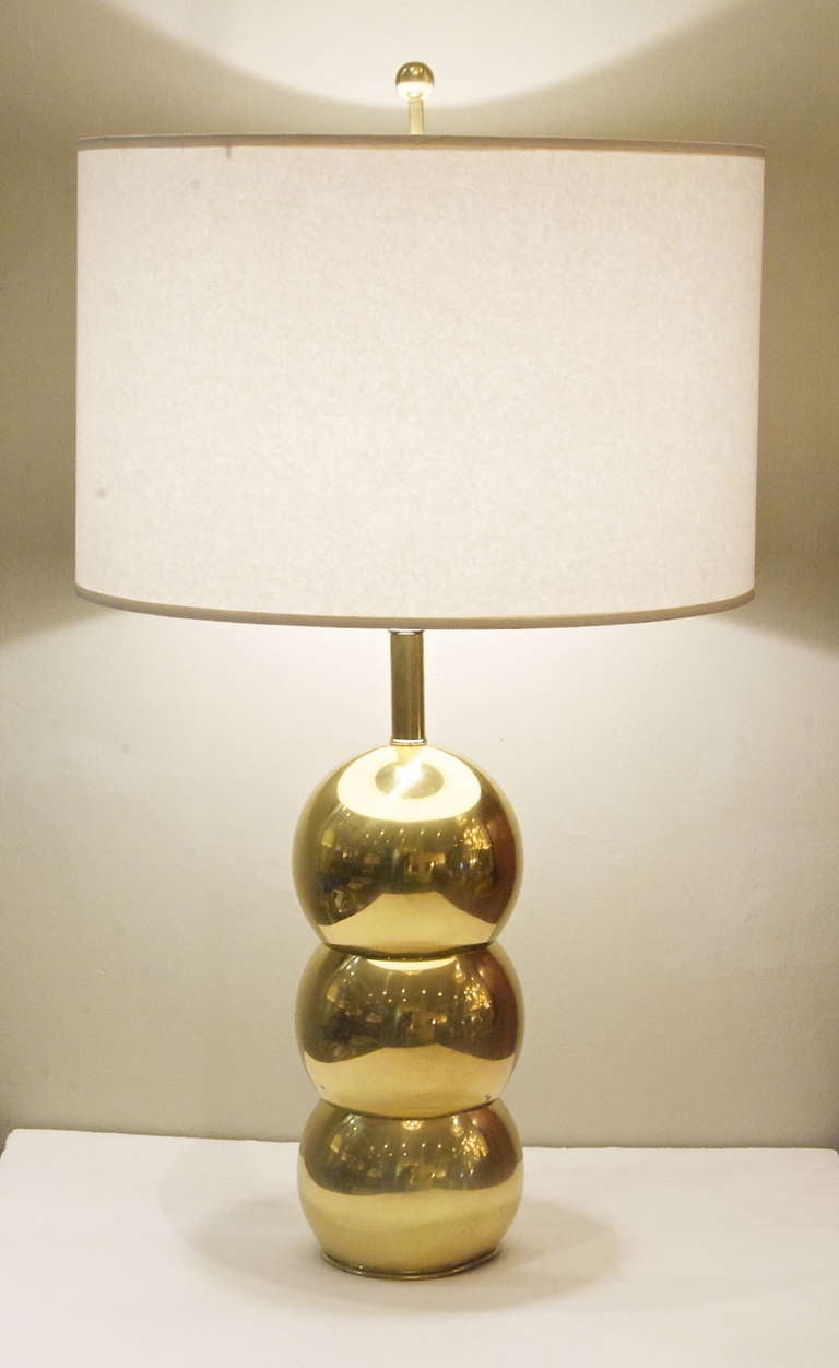 A classic Kovacs stacked ball table lamp, in brass.  New wiring. Height listed is to top of socket.  Shade is for demonstration purposes only and is not included.
