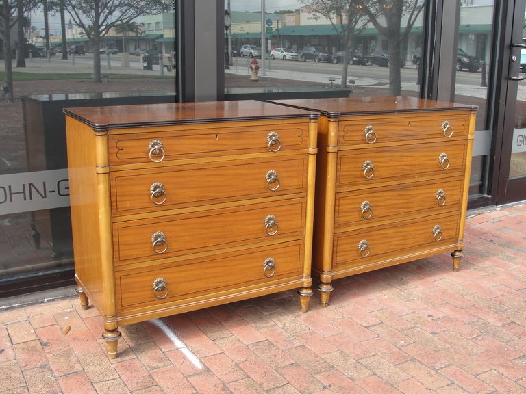 Amazing pair of chest of drawers well constructed of solid Walnut with round brass handles.

All original condition (some scratches) - wonderful pulls and exotic wood accents.

Can be restored (Lacquered or dark stained) for additional cost.