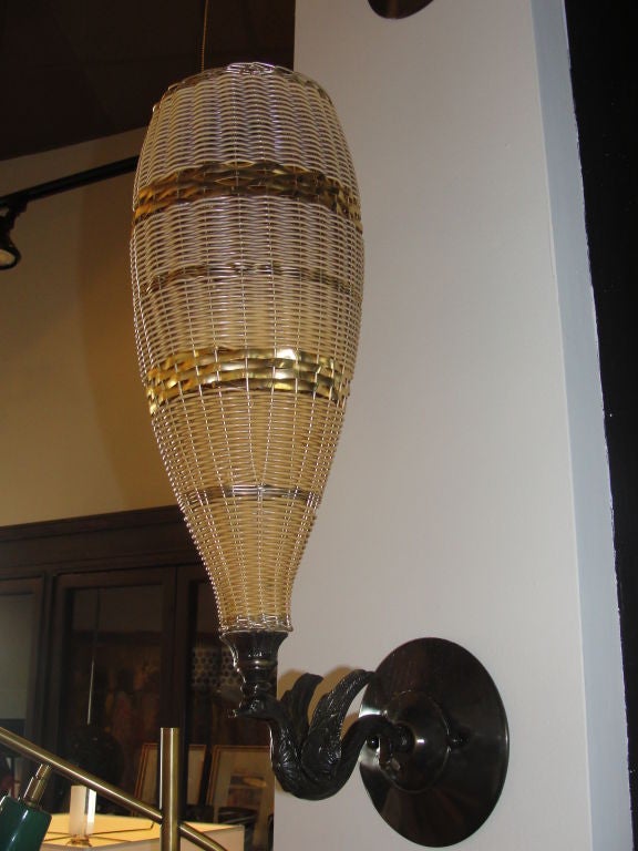 A Rare Trio (3) of Woven Cane Wall Sconces