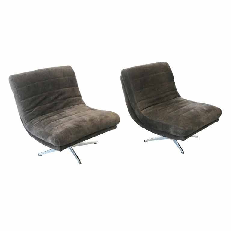 Pair of Stunning Swivel Slipper Chairs in Leather