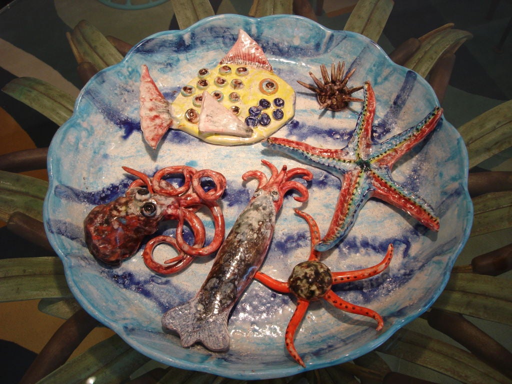 Astoundingly well crafted vintage glazed ceramica plate of various seafood (octopus, squid, fish, etc.)