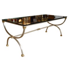 An Italian Brushed Steel and Brass Cocktail Table
