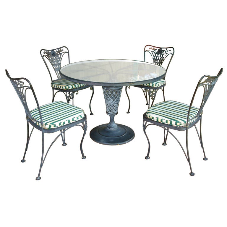 Extremely well crafted garden or kitchen set in forest green patina.