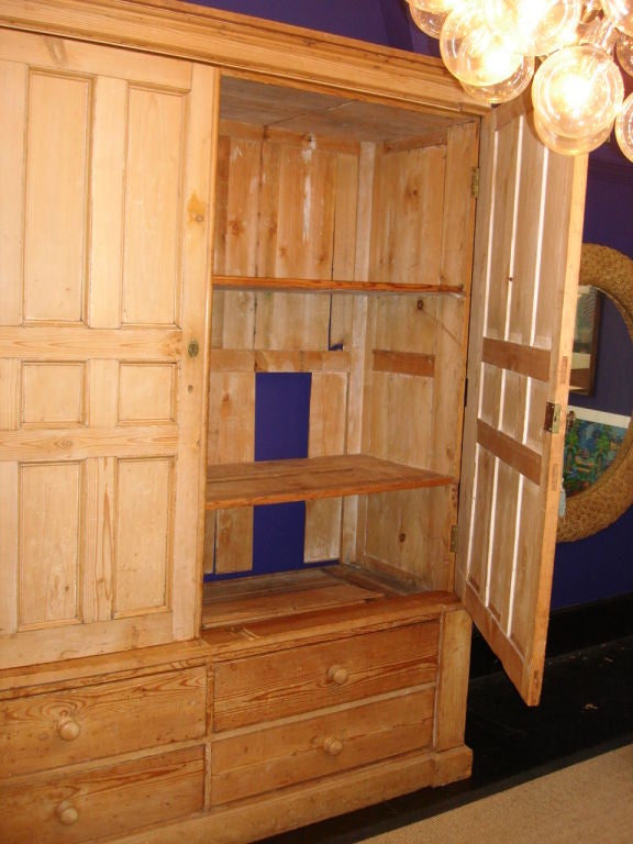 large armoire with drawers