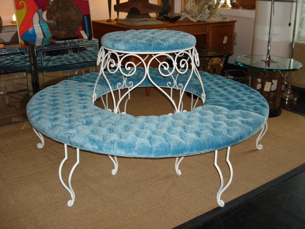 Over the top!  Tight tufted throughout.  This was found in a garden around a tree but it has been upgraded and restore for Indoor use.  NOTE: top upholstered disc can be removed to set this piece around a column or tree.  The top disc can also