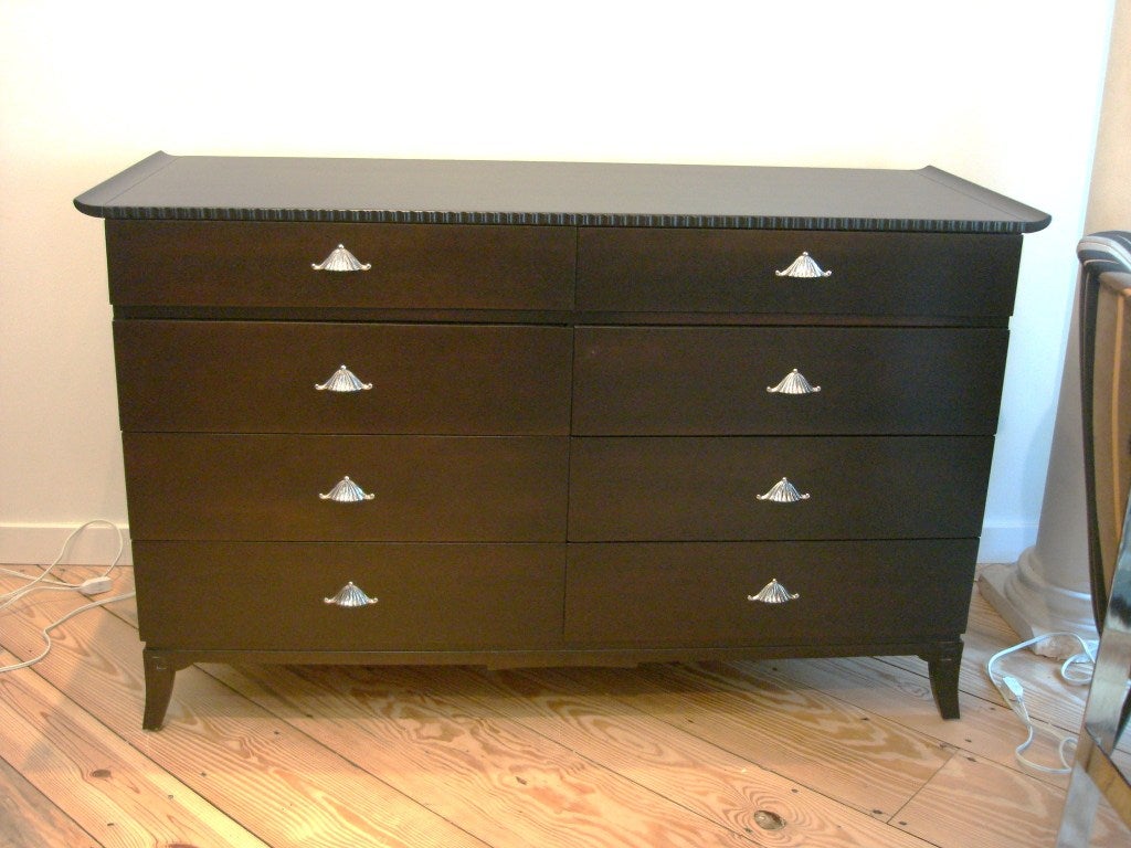 Eight drawers with nickel pagoda shaped hardware and rich dark brown stain finish (almost ebonized) - showing natural grains and beauty.

Extremely well crafted with beautiful details.