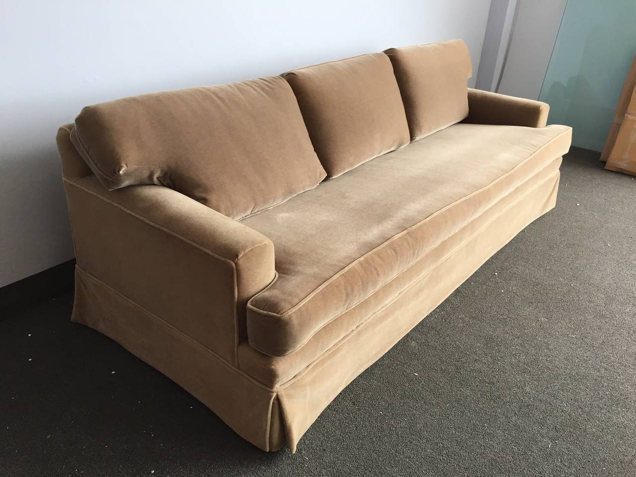 Fresh from a Southampton estate, this incredible high quality long sofa with single seat cushion and low back cushions. Very comfortable!

