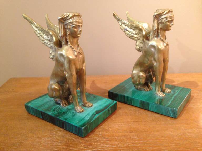 Mounted on real Russian malachite bases, these Egyptian mythological creatures are heavy and truly a conversation piece.