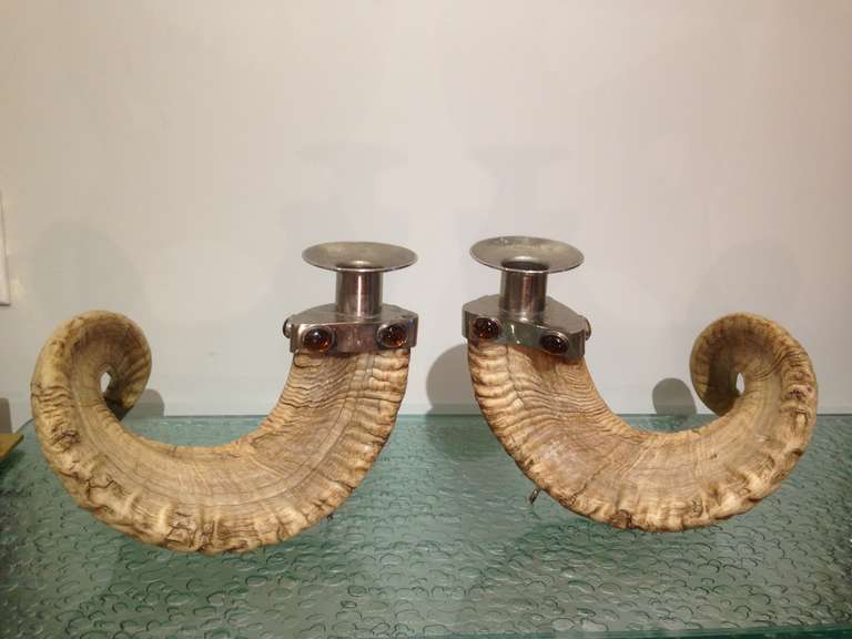 Adorned with amber glass cabochons these rams horn and alpaca candlesticks are large and in wonderful vintage condition.