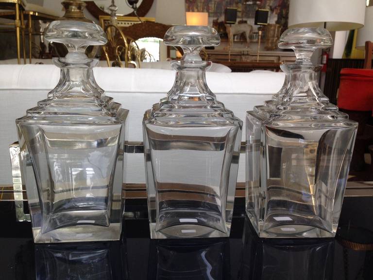 Wonderful set of three crystal decanters from the Art Deco period. Wonderful condition for their age.