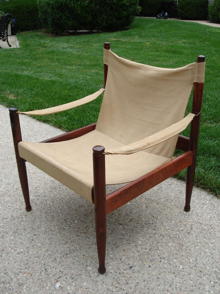 Original canvas seat, in rich rosewood, marked to underside.  Made in Denmark.