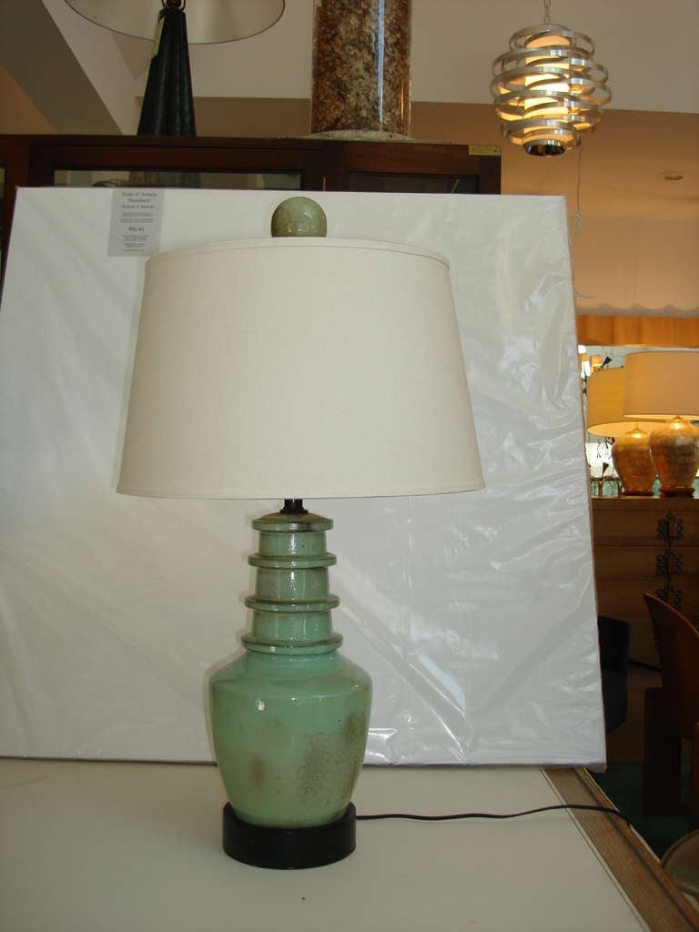 Sage tone glazed ceramic lamp with matching handmade ceramic finial.
Additional Dimensions: Base only height 16.25.  Shade NOT included.