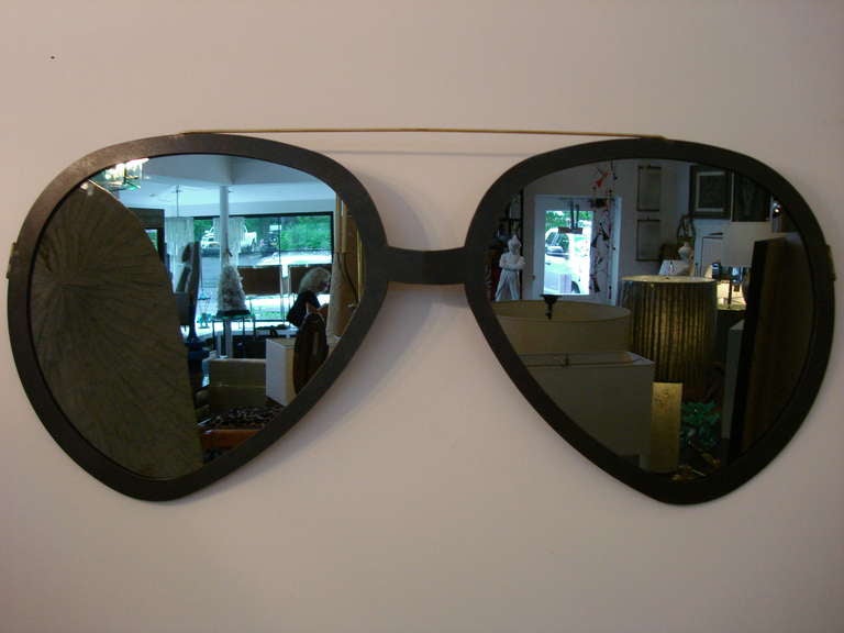 Smoked mirror and OVERSIZED Aviator sunglasses are an excellent wall sculpture and practical for use.