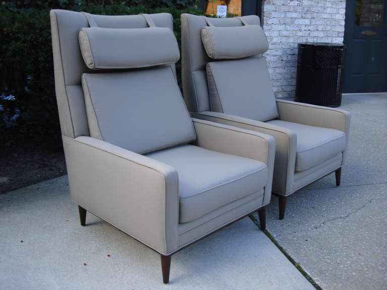These two comfy chairs have matching ottomans (sold separately).