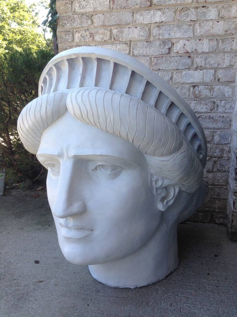 "Remembering we are a land of immigrants" This iconic bust is made of thick fiberglass, heavily constructed - this perfect detailed bust scale model of Lady Liberty.  Great prop piece or a true sculpture.