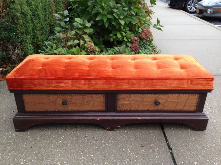 Vibrant orange vintage upholstery with copper patchwork detail drawers. Well constructed and solid.