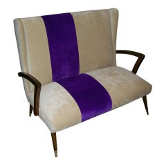 A Sculptural High-back Winged Canape/Settee