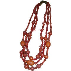 A Vintage Coral and Bone Three-Strand Necklace