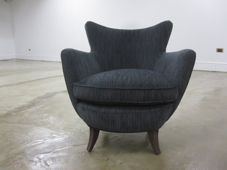 Original and very comfortable design, this chair by Ernest Schwadron was retailed in New YorK by Rena Rosenthal inc. Looking at this chair one can see the influence Schwadron had on  the young Vladimir  Kagan while working in the same studio.