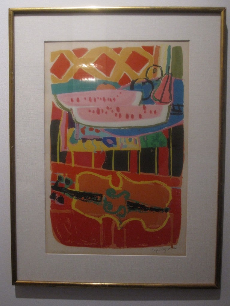 Striking lithograph by Roger Bezombes from 1956.    Depicting a still life with violin and watermelon, Bezombes uses vibrant colors and patterns to merge abstraction with realism.  His paintings and graphics are in major museum collections.  
