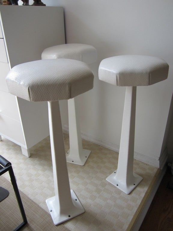 Newly refinished and reupholsterd counter or bar stools reminiscent of old soda fountain stools.