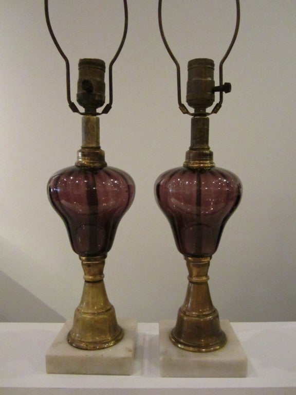 Pair of electrified early kerosene period lights.