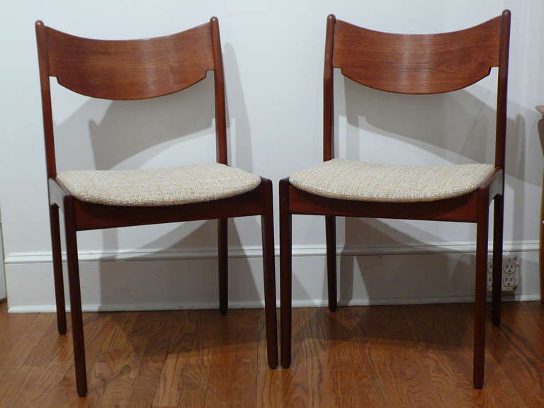 Pair of 1960's Danish chairs, newly reupholstered. Can be used for dining,  office, desk or as occasional chairs. Very subtle design.